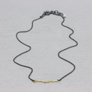 Necklace silver oxy with touch of gold curl
