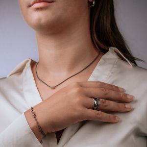 Armband Silber Oxy + 9 Karat Ringe