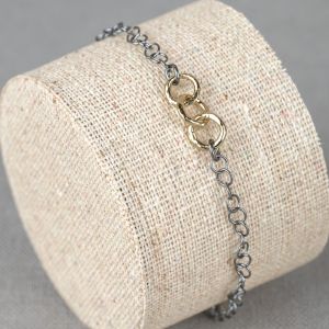 Armband zilver oxy + 9 karaat ringen