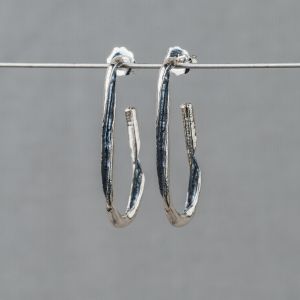 Oorhoepel zilver oxy twister lang