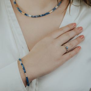 Ring zilver + 9 karaat + Kyaniet roosje