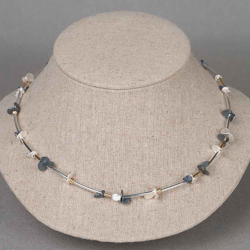 Collier buisjes en schijfjes