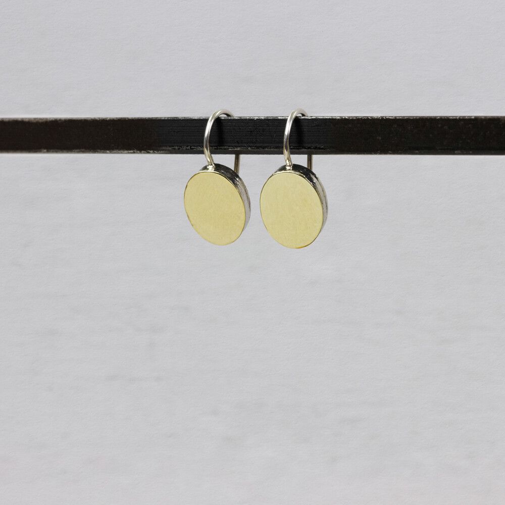 Oorbellen zilver + 9 karaat ovaaltje