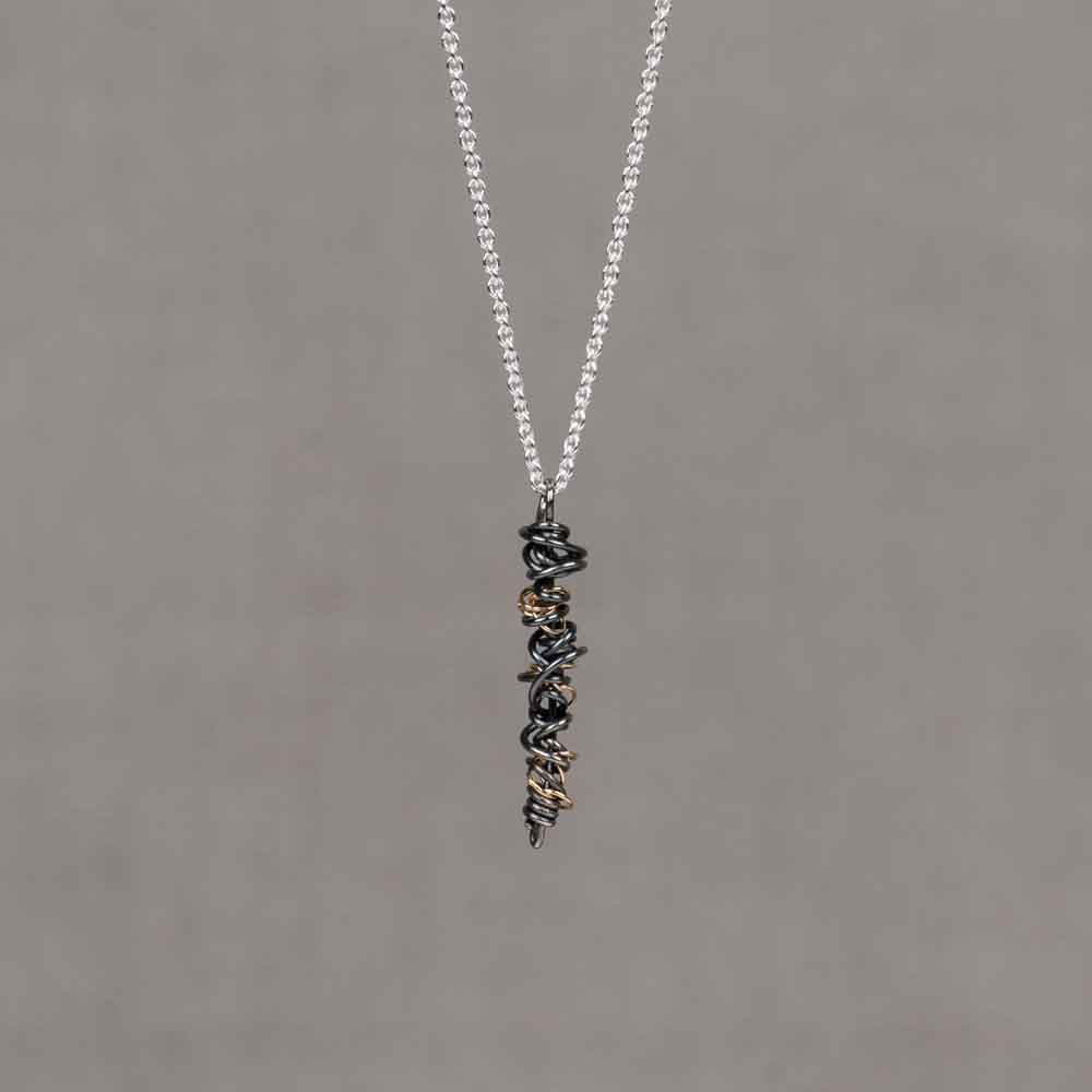 Collier zilver + Twister oxy + 9 krt