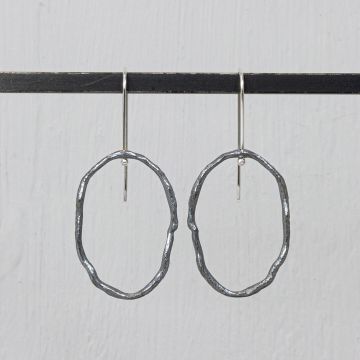 Offener organischer Oxy-Ohrring